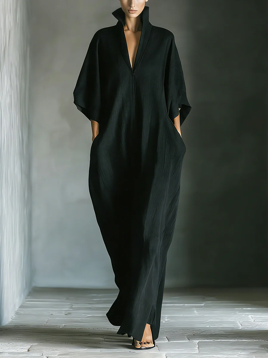 Alessandra • Vestido largo negro oversize minimalista con mangas kimono