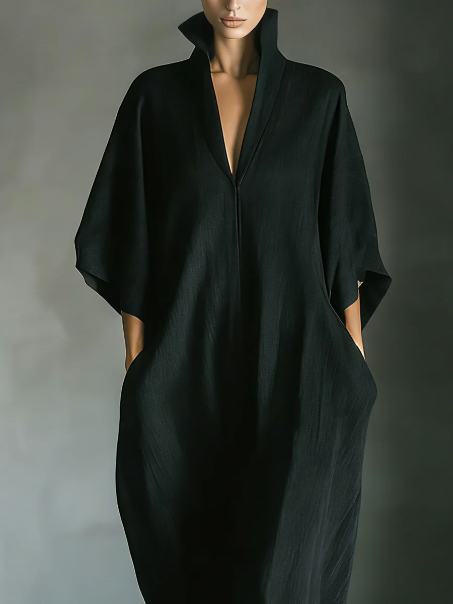 Alessandra • Vestido largo negro oversize minimalista con mangas kimono